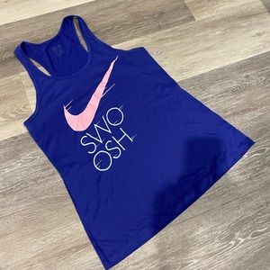 Nike "Swoosh" Dry fit top.